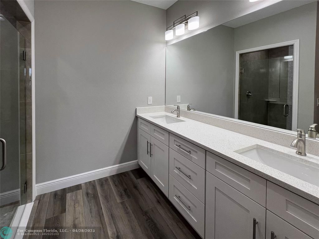 528 Southeast 35th Terrace Okeechobee, FL 34974 - Photo 3 of 4 a bathroom with a sink and a mirror