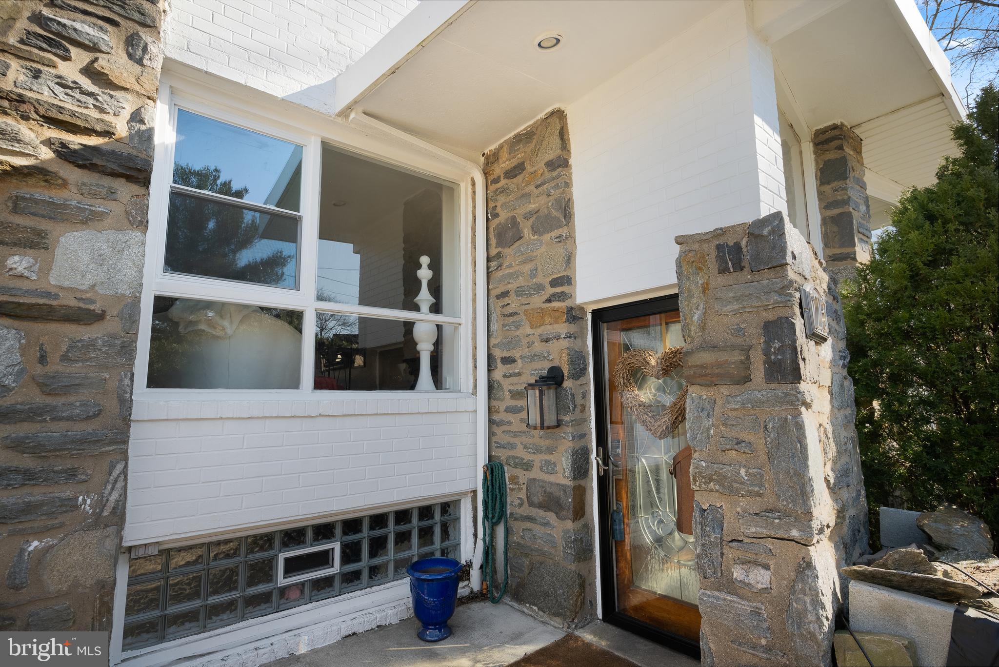 2737 East Country Club Road Philadelphia, PA 19131 - Photo 24 of 24 a view of a brick house with a door