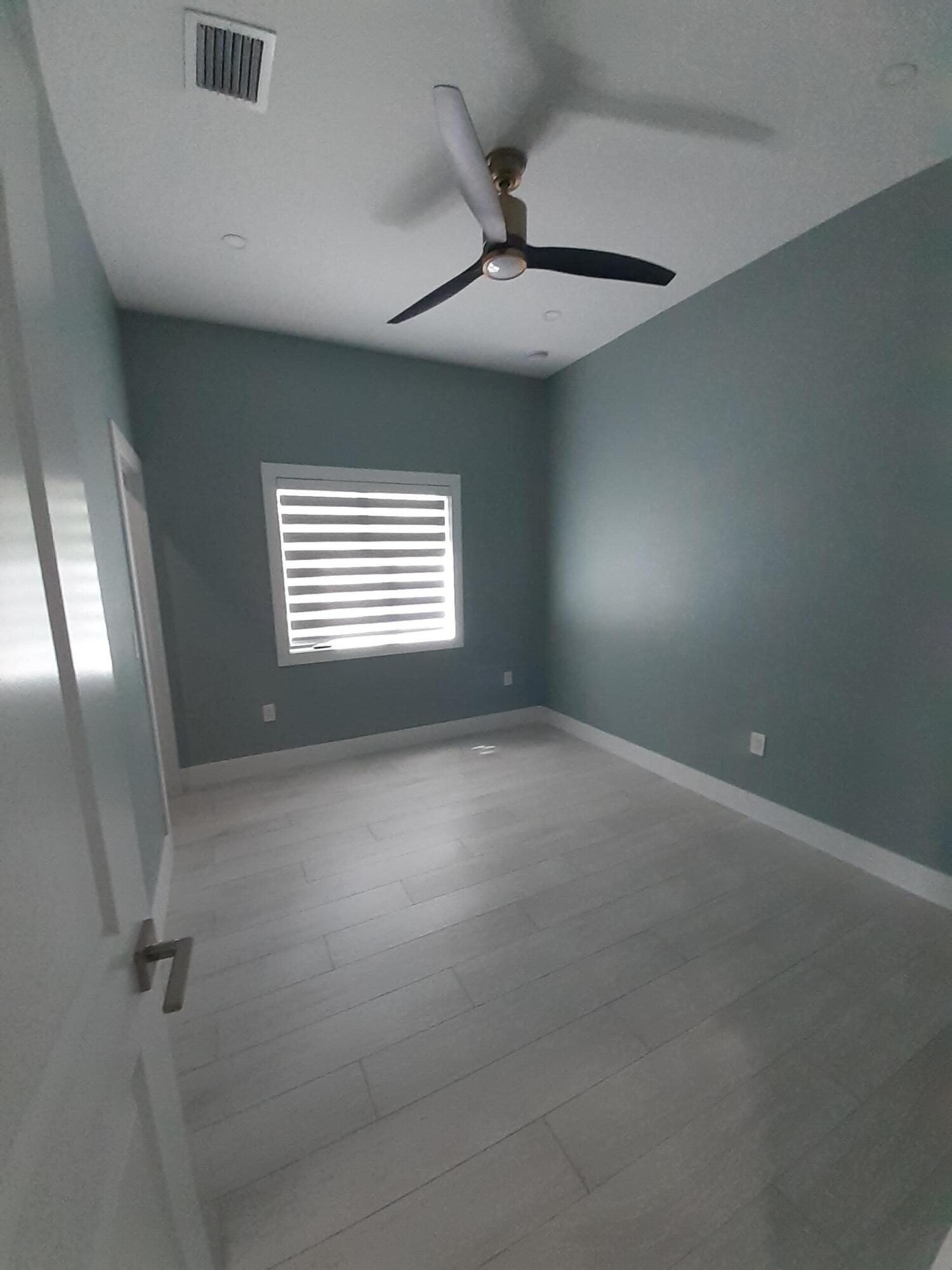 23 Jenny Lane Key Largo, FL 33037 - Photo 15 of 38 a view of an empty room with a window