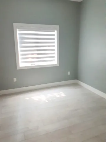 a bathroom with double vanity