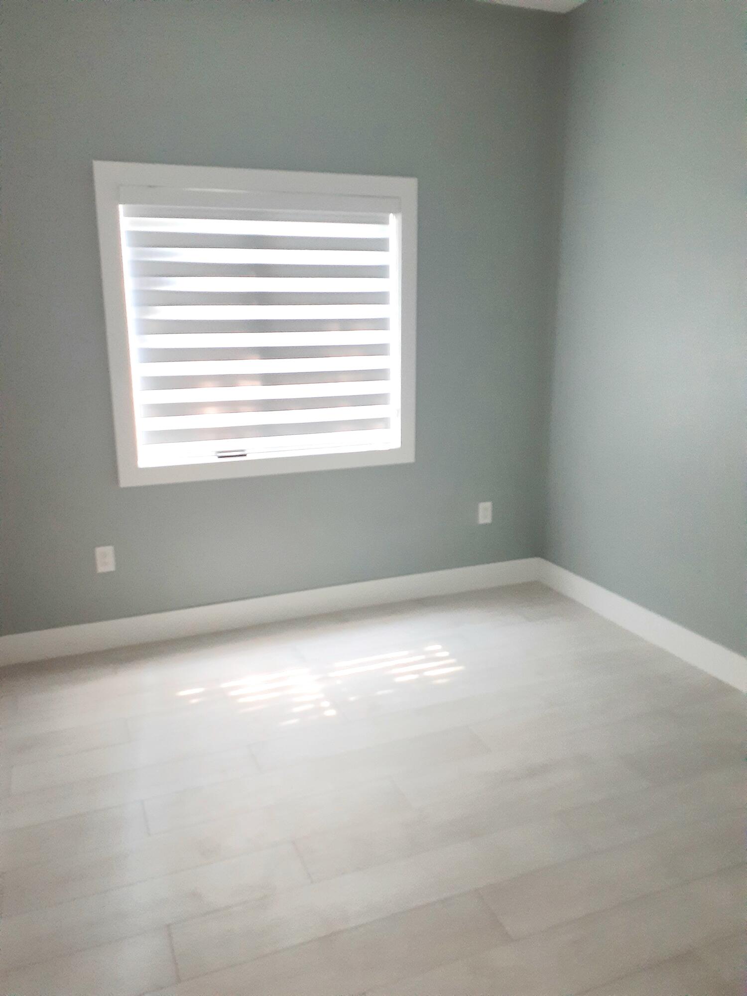 23 Jenny Lane Key Largo, FL 33037 - Photo 20 of 38 an empty room with a window