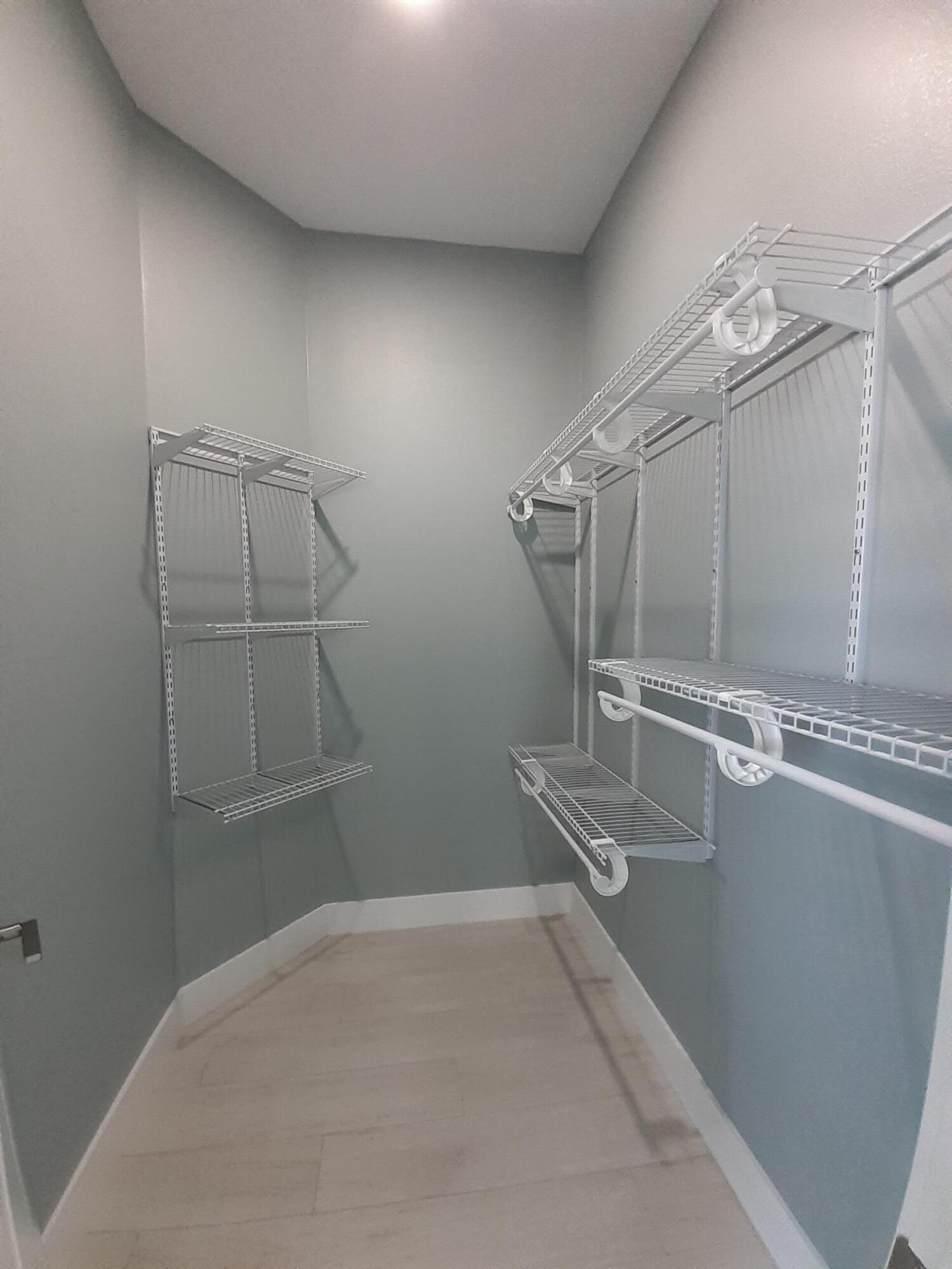 23 Jenny Lane Key Largo, FL 33037 - Photo 28 of 38 view of a room with racks on the wall