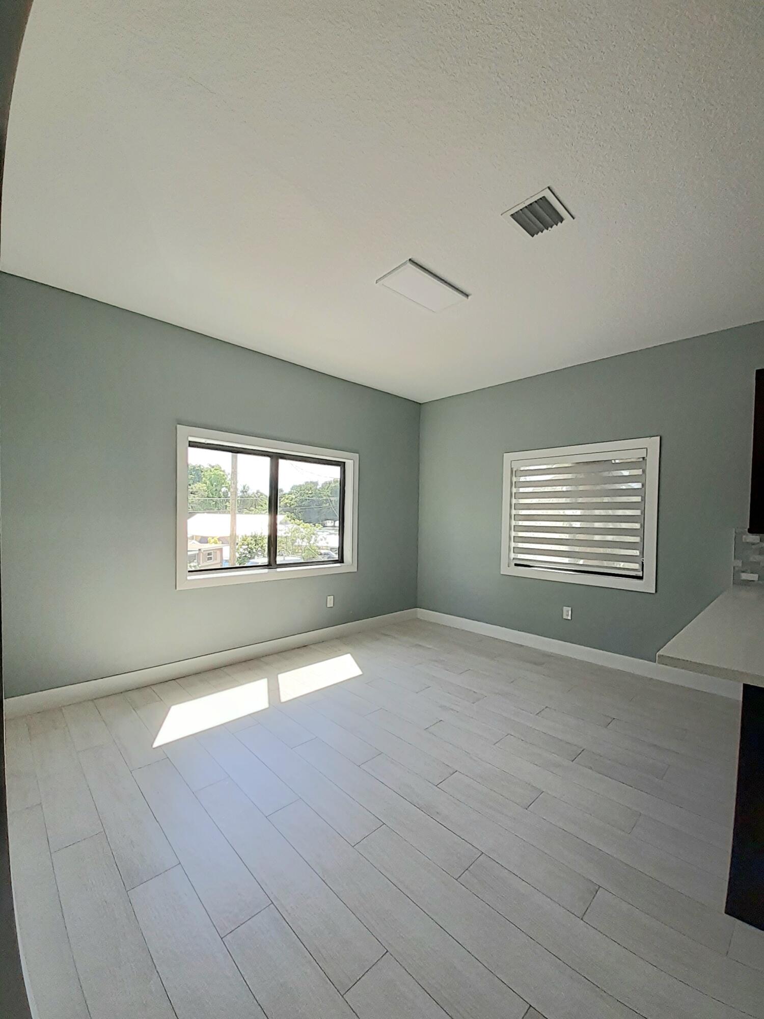 23 Jenny Lane Key Largo, FL 33037 - Photo 4 of 38 a view of an empty room with a window