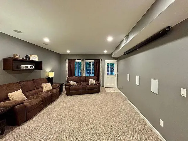 a living room with furniture and a couch