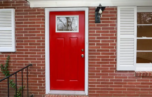 a view of a pathway both side of house