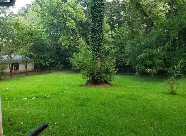 a view of a backyard with a garden