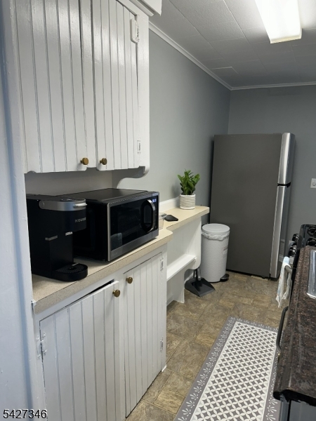 268 Chambers Street, Unit 2 Phillipsburg, NJ 08865 - Photo 5 of 9 a kitchen with a sink and a stove top oven