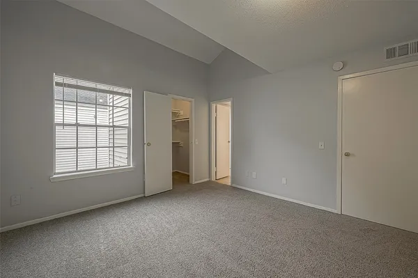 an empty room with an entryway