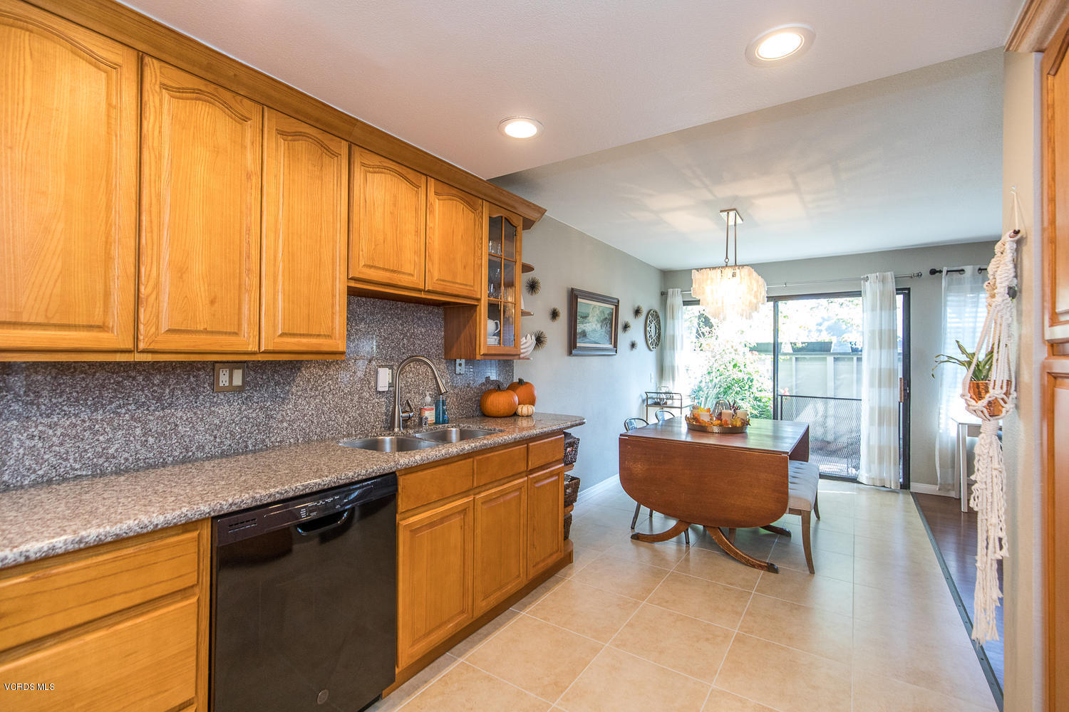 6542 Stoney View Lane, Unit 5 Simi Valley, CA 93063 - Photo 17 of 32 a kitchen with stainless steel appliances granite countertop sink stove and cabinets