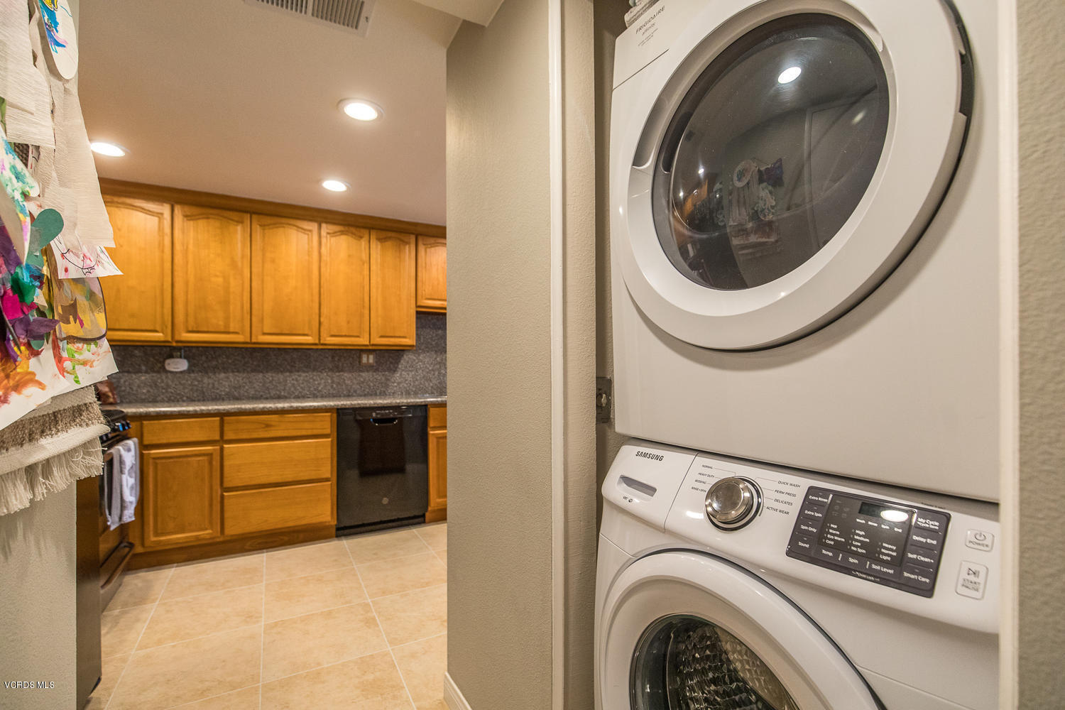 6542 Stoney View Lane, Unit 5 Simi Valley, CA 93063 - Photo 19 of 32 a view of a kitchen with washer and dryer