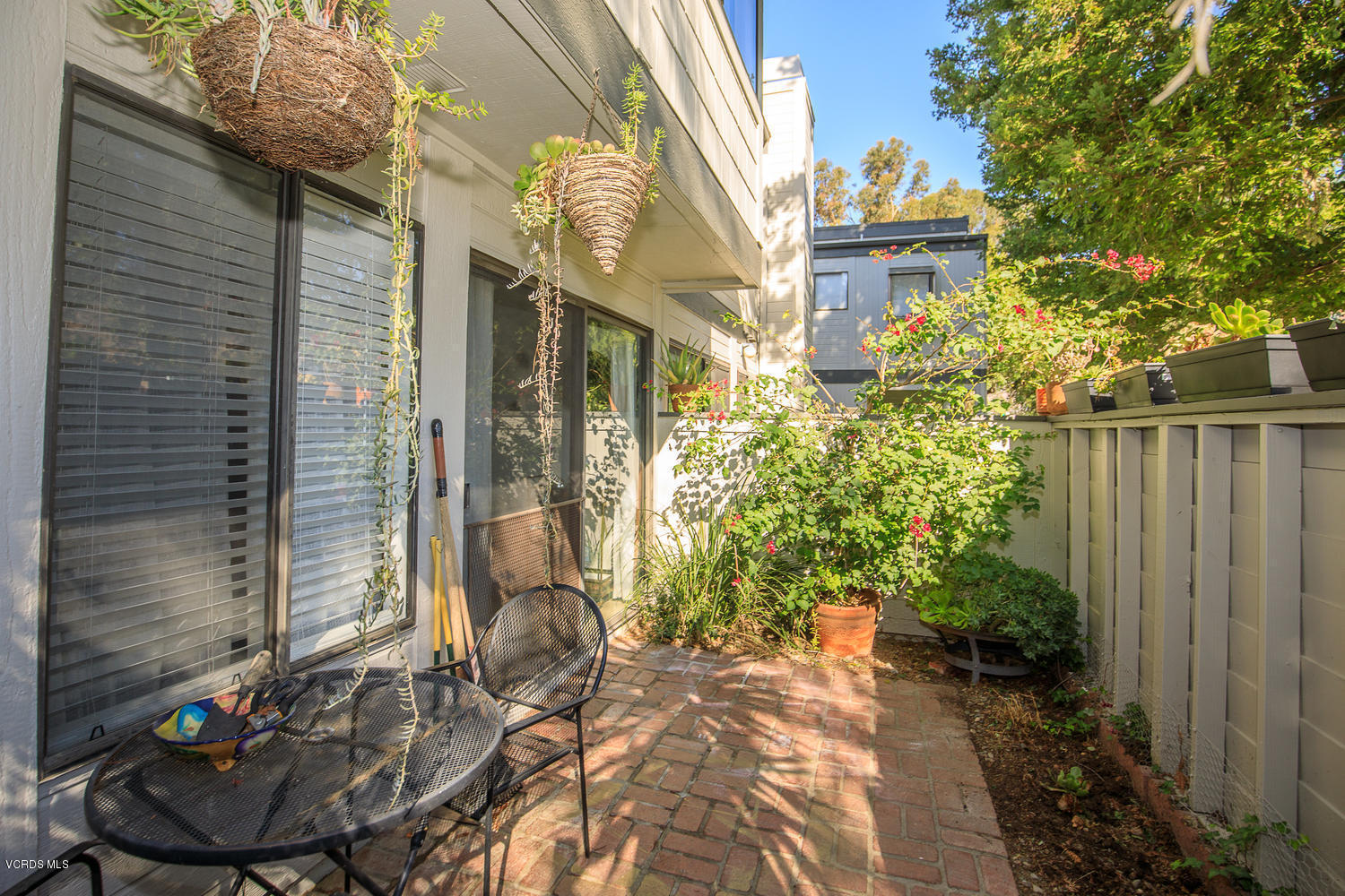 6542 Stoney View Lane, Unit 5 Simi Valley, CA 93063 - Photo 31 of 32 a view of a house with a yard