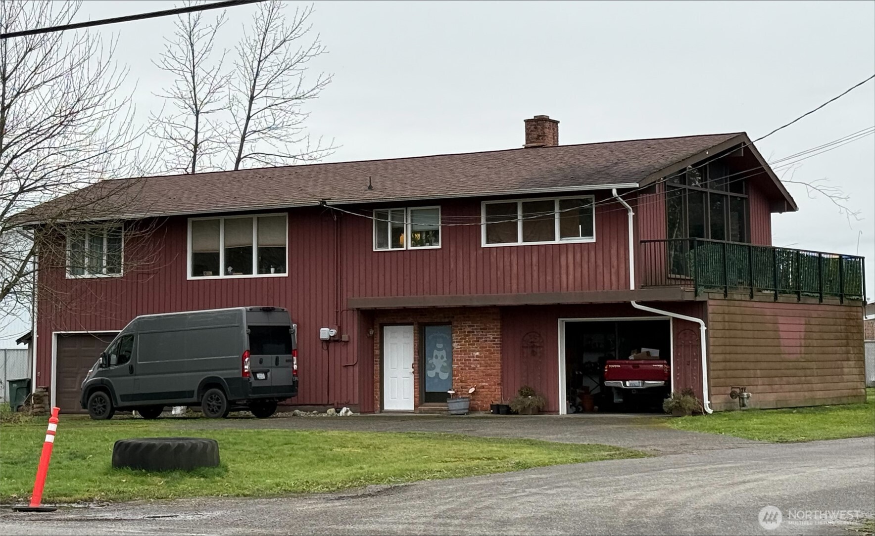 7999 Rathbone Road Ferndale, WA 98248 - Photo 1 of 1 a front view of a house with a yard