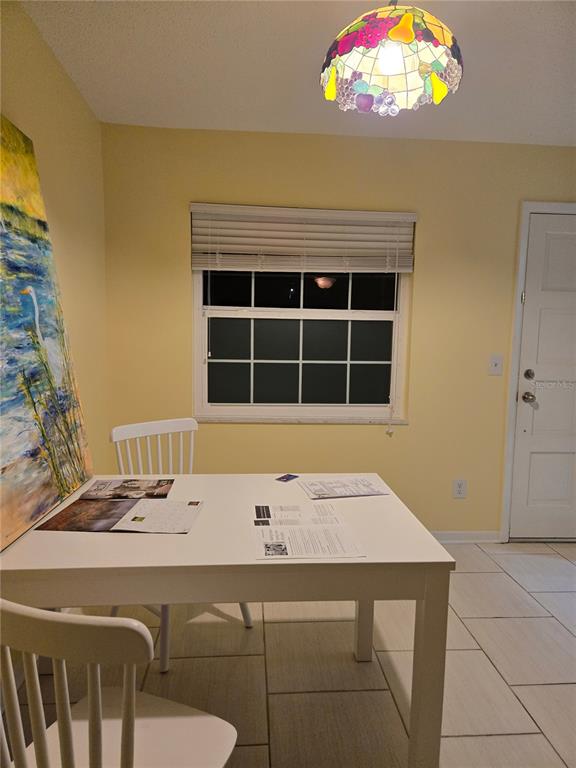 1701 Pinehurst Road, Unit 3E Dunedin, FL 34698 - Photo 3 of 10 a bathroom with a sink and a bathtub