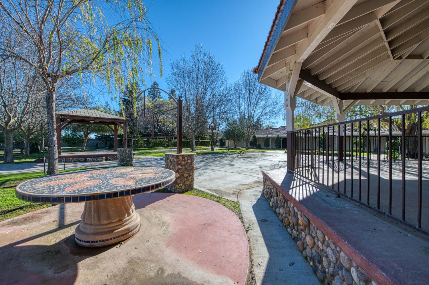24607 Gardena Drive Madera, CA 93638 - Photo 43 of 74 a view of a backyard with sitting area