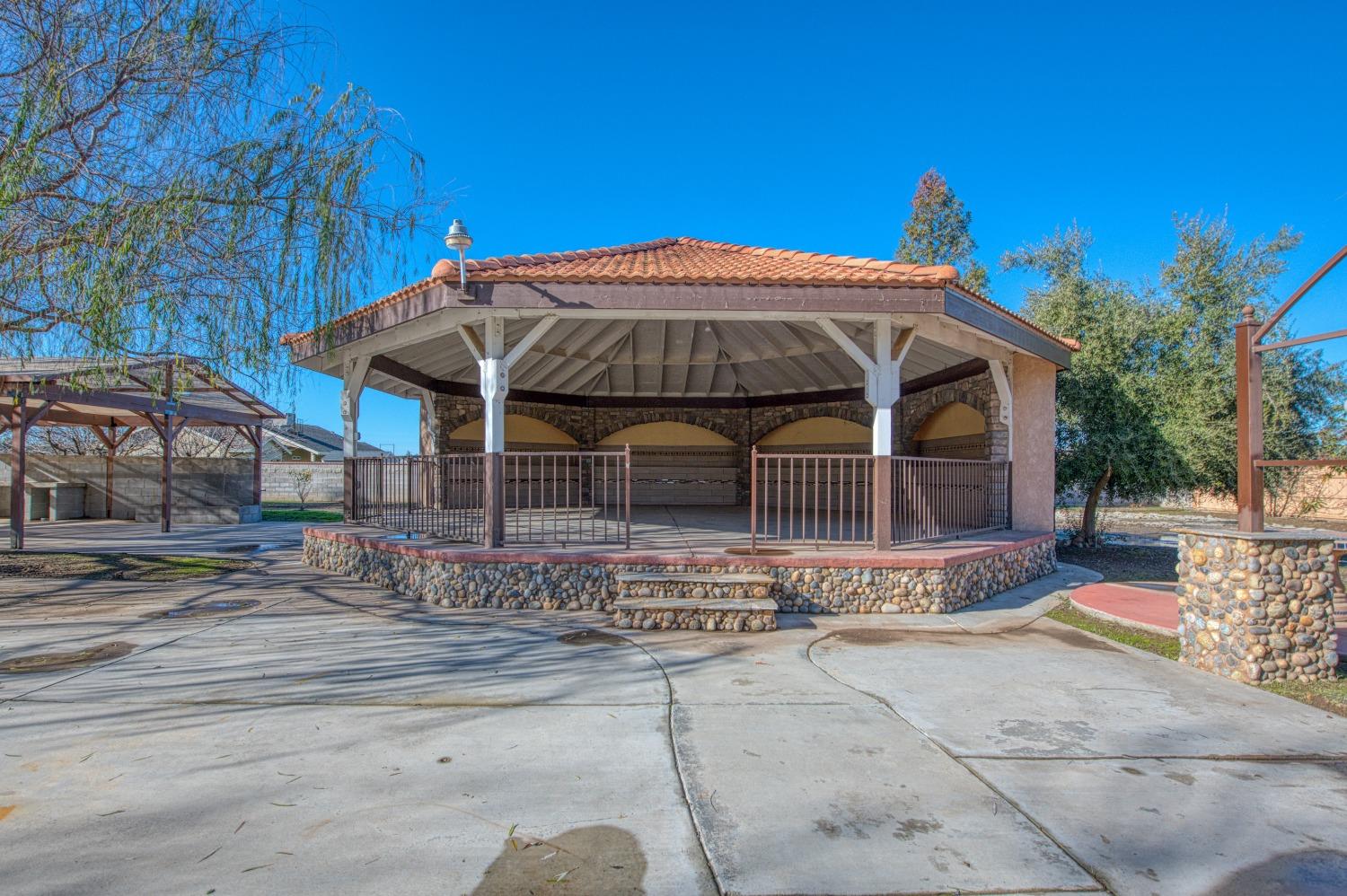 24607 Gardena Drive Madera, CA 93638 - Photo 44 of 74 a view of a house with a yard