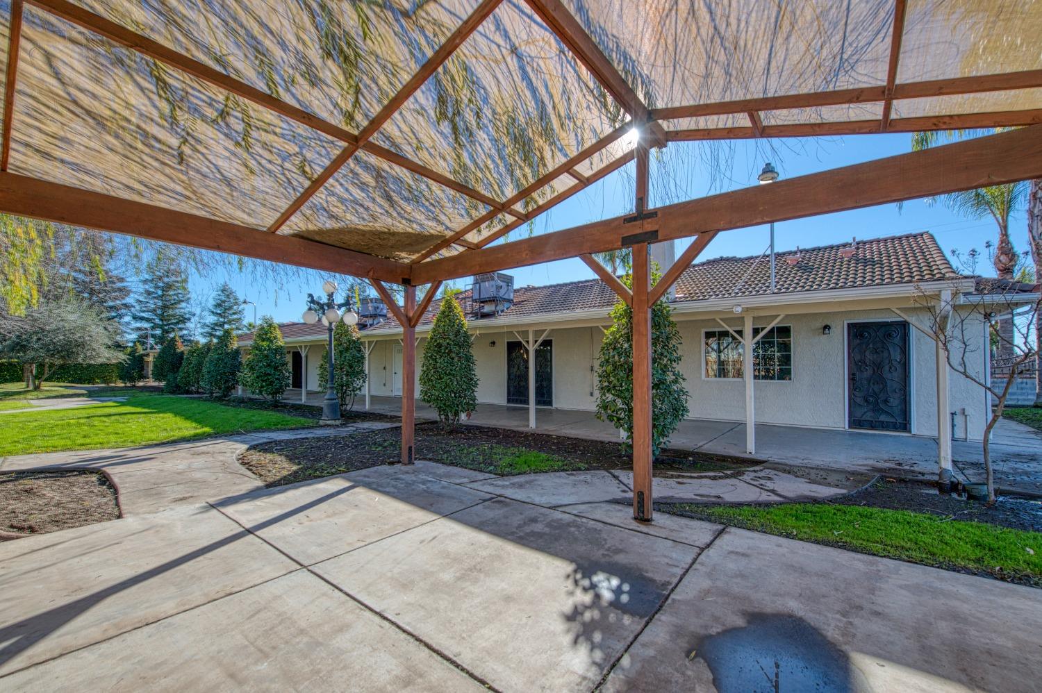 24607 Gardena Drive Madera, CA 93638 - Photo 51 of 74 a view of a house with a yard