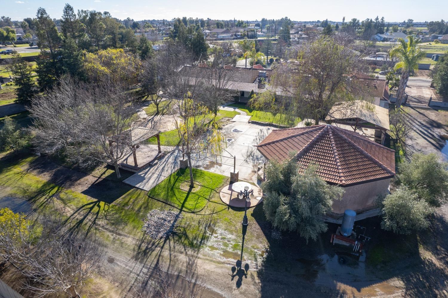 24607 Gardena Drive Madera, CA 93638 - Photo 65 of 74 a view of a house with a yard