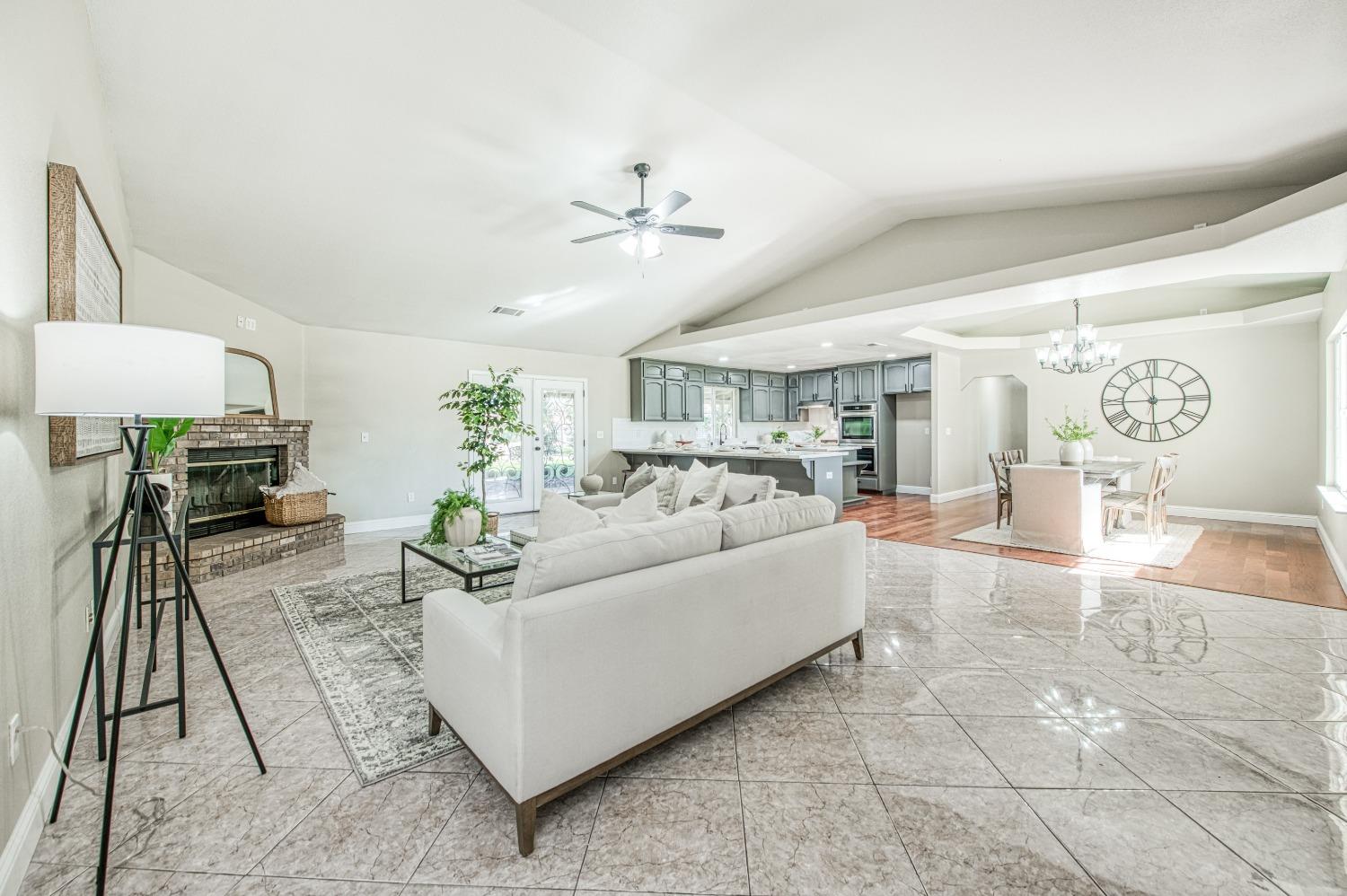 24607 Gardena Drive Madera, CA 93638 - Photo 7 of 74 a living room with furniture and a table
