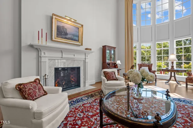 a kitchen with stainless steel appliances granite countertop a lot of counter space and wooden floors