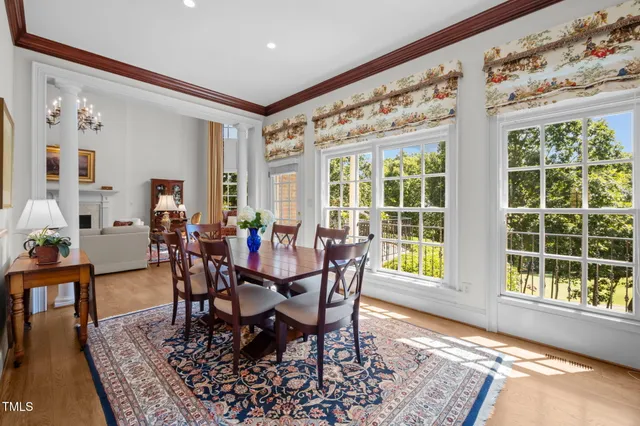 a kitchen with stainless steel appliances granite countertop a stove a refrigerator and a wooden cabinets