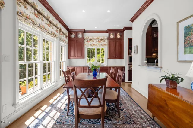 a view of a kitchen cabinets and a wooden floor