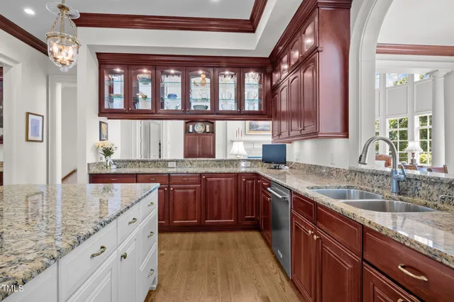 a view of a livingroom with furniture and staircase