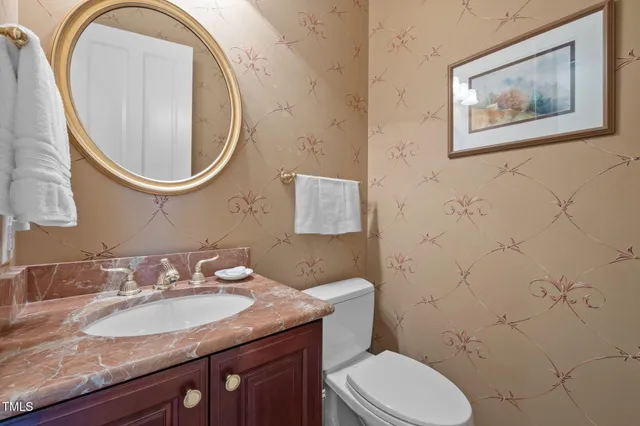 a view of a living room and dining room