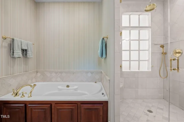 a bed room with a bed and a couch