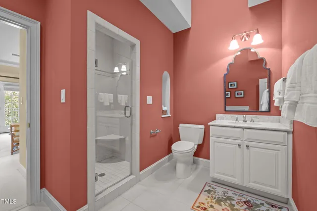 a projector room with furniture and a flat screen tv