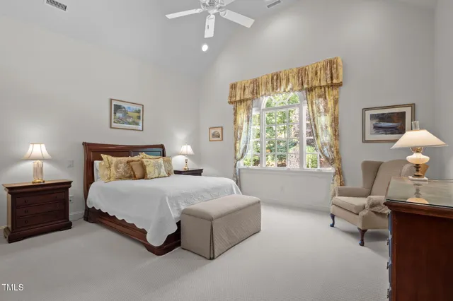 a bathroom with a toilet sink and shower