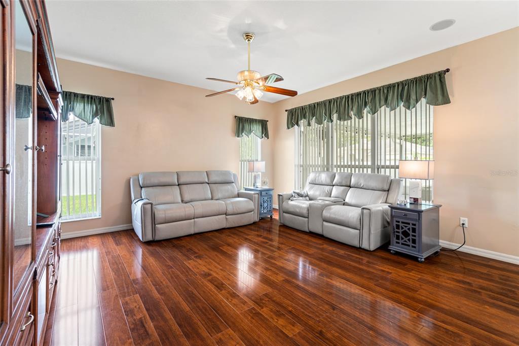 28390 Openfield Loop Wesley Chapel, FL 33543 - Photo 18 of 44 a living room with furniture and a large window