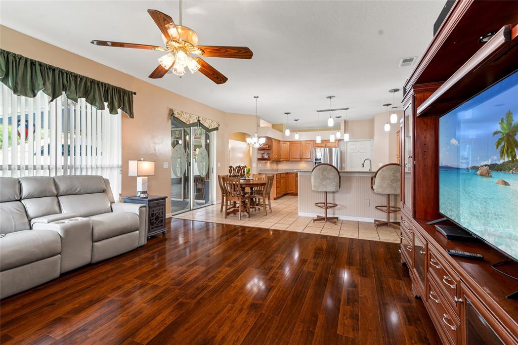 28390 Openfield Loop Wesley Chapel, FL 33543 - Photo 19 of 44 a living room with furniture and a table