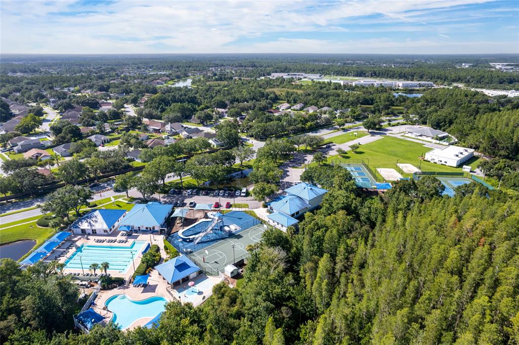 28390 Openfield Loop Wesley Chapel, FL 33543 - Photo 38 of 44 an aerial view of residential houses with outdoor space