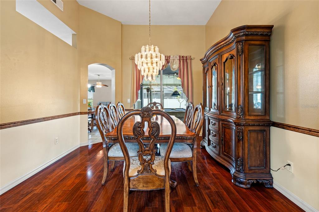 28390 Openfield Loop Wesley Chapel, FL 33543 - Photo 6 of 44 a dining room with furniture window and wooden floor
