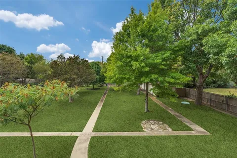 a view of a golf course with a lake