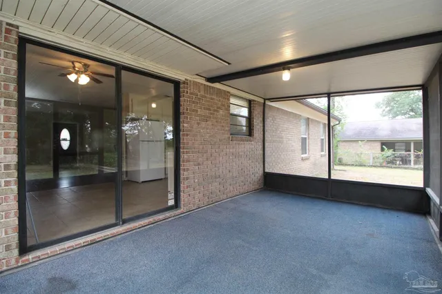 a view of a hallway with a large window