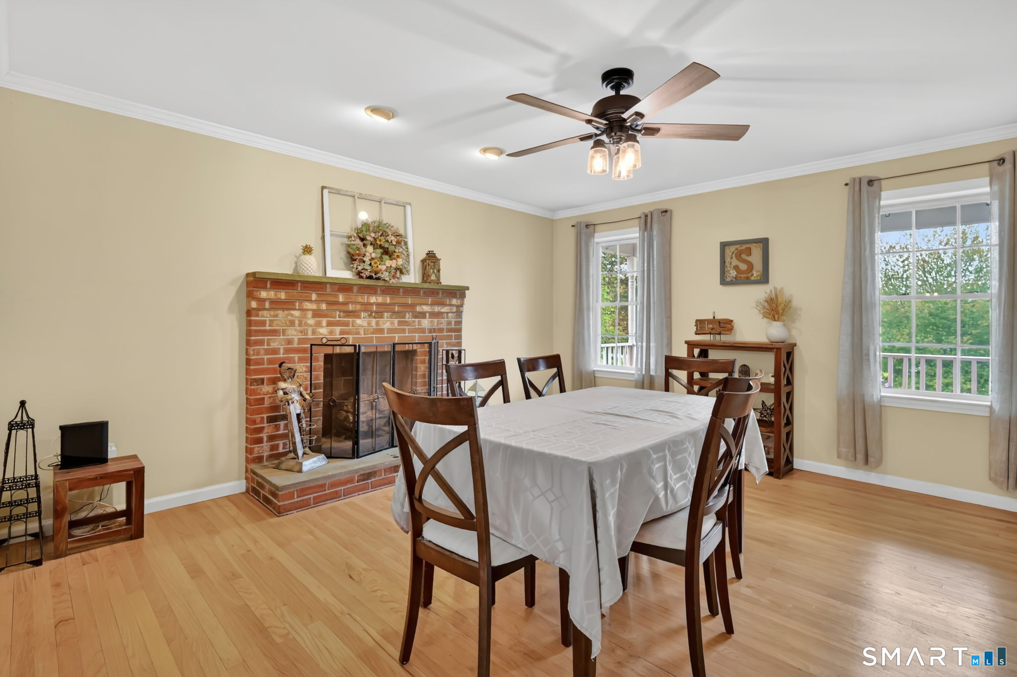 5 Tuckers Run Ledyard, CT 06339 - Photo 14 of 39 a view of a dining room with furniture and wooden floor