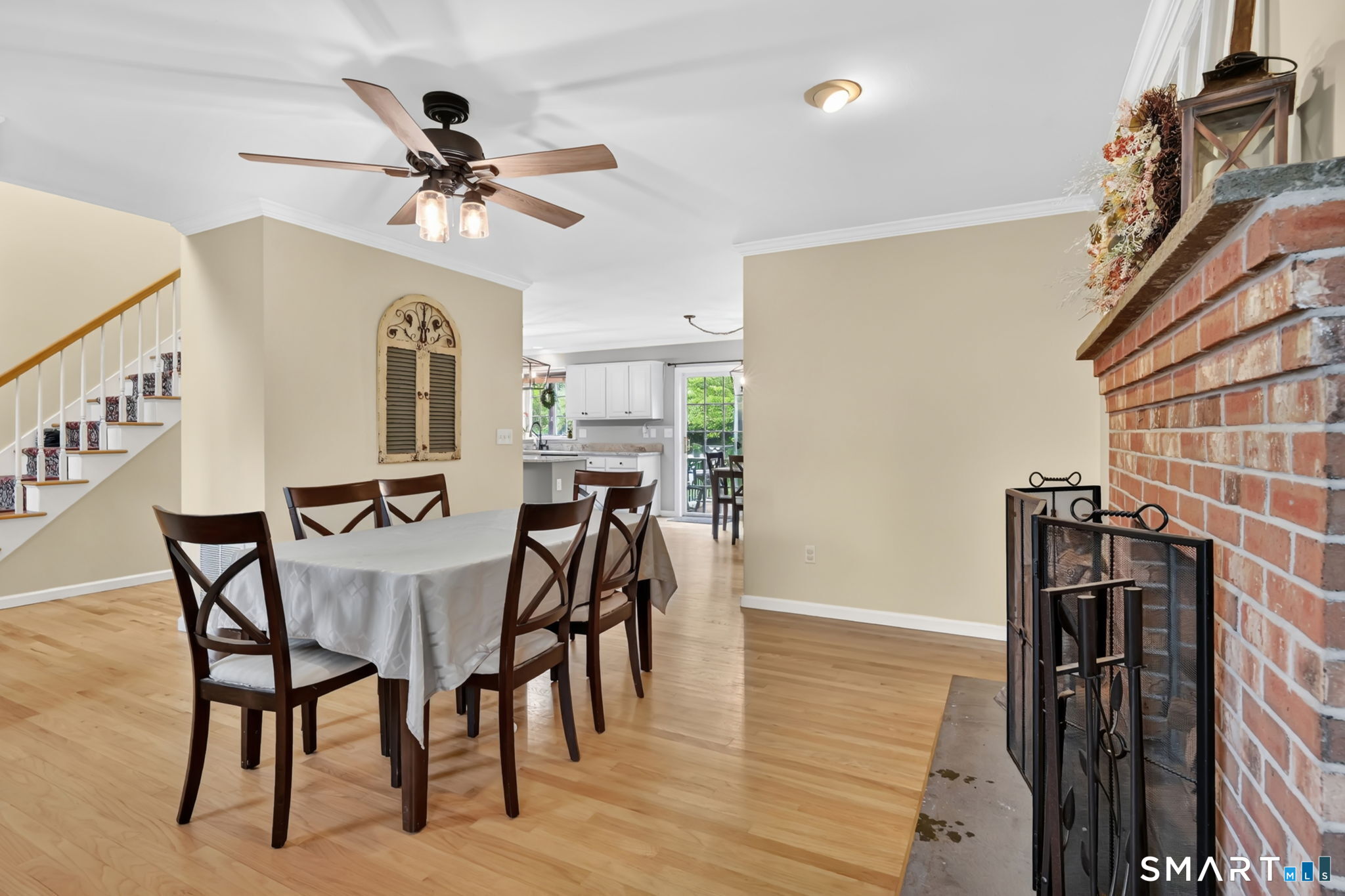 5 Tuckers Run Ledyard, CT 06339 - Photo 16 of 39 a view of a dining room with furniture and wooden floor