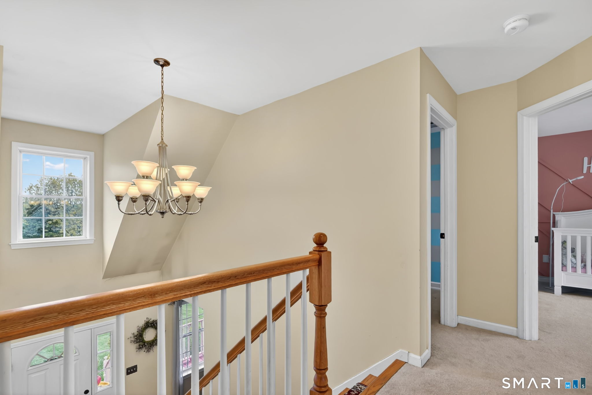 5 Tuckers Run Ledyard, CT 06339 - Photo 22 of 39 a view of a hallway with windows