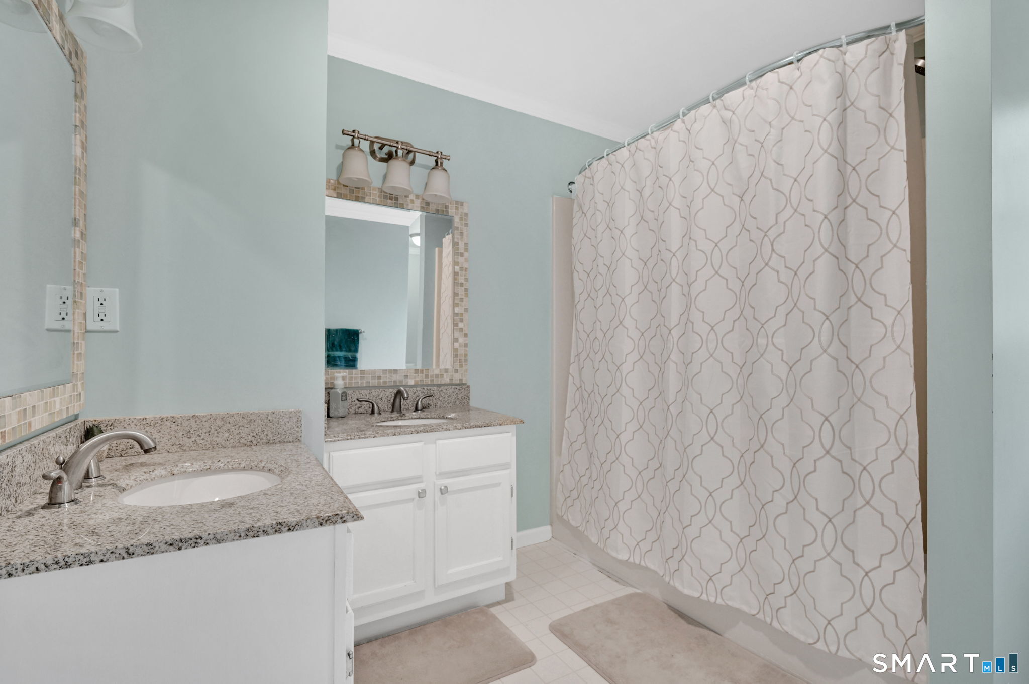 5 Tuckers Run Ledyard, CT 06339 - Photo 25 of 39 a bathroom with a granite countertop sink and a mirror