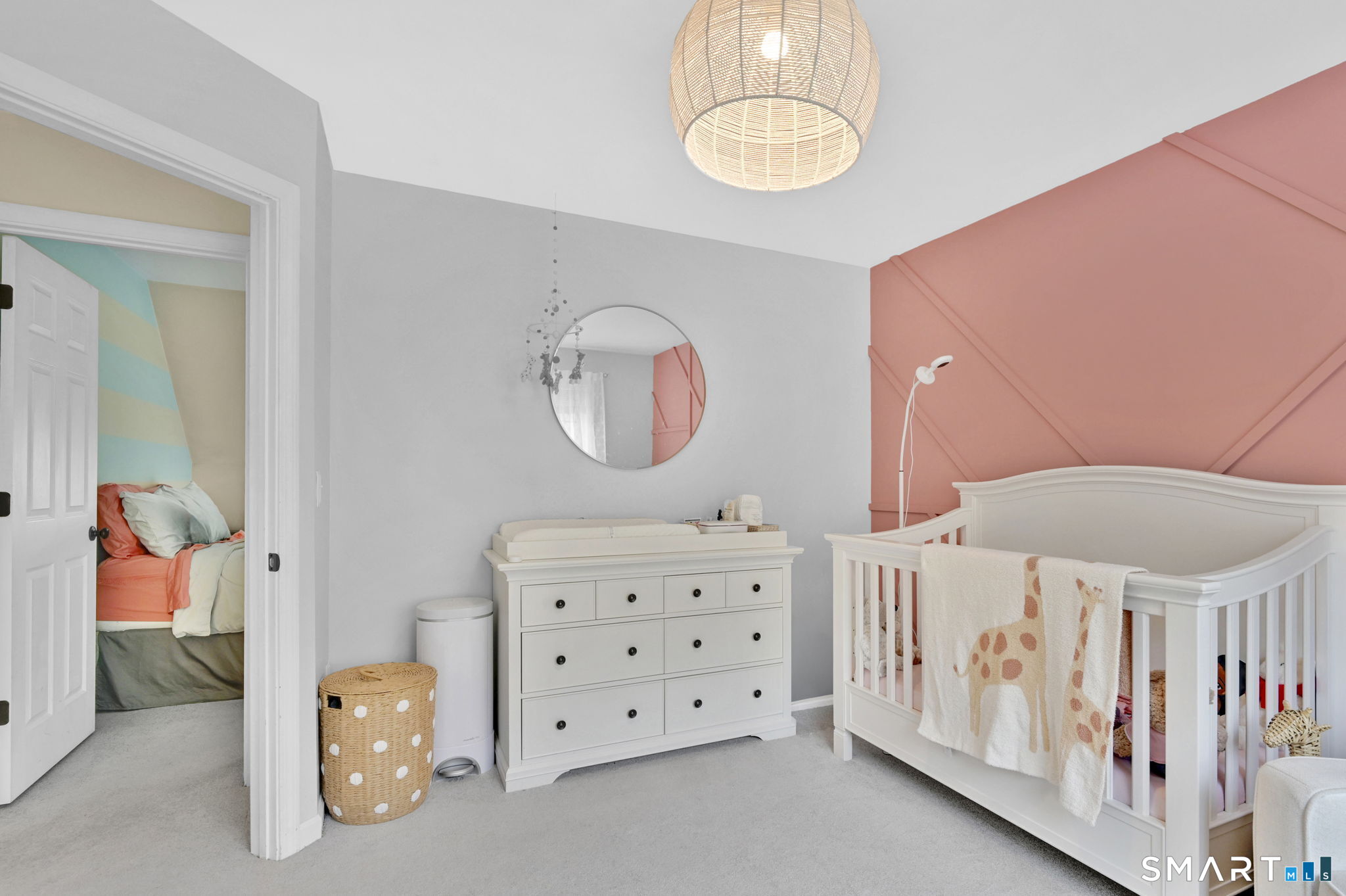 5 Tuckers Run Ledyard, CT 06339 - Photo 27 of 39 a bedroom with a bed window and a baby crib