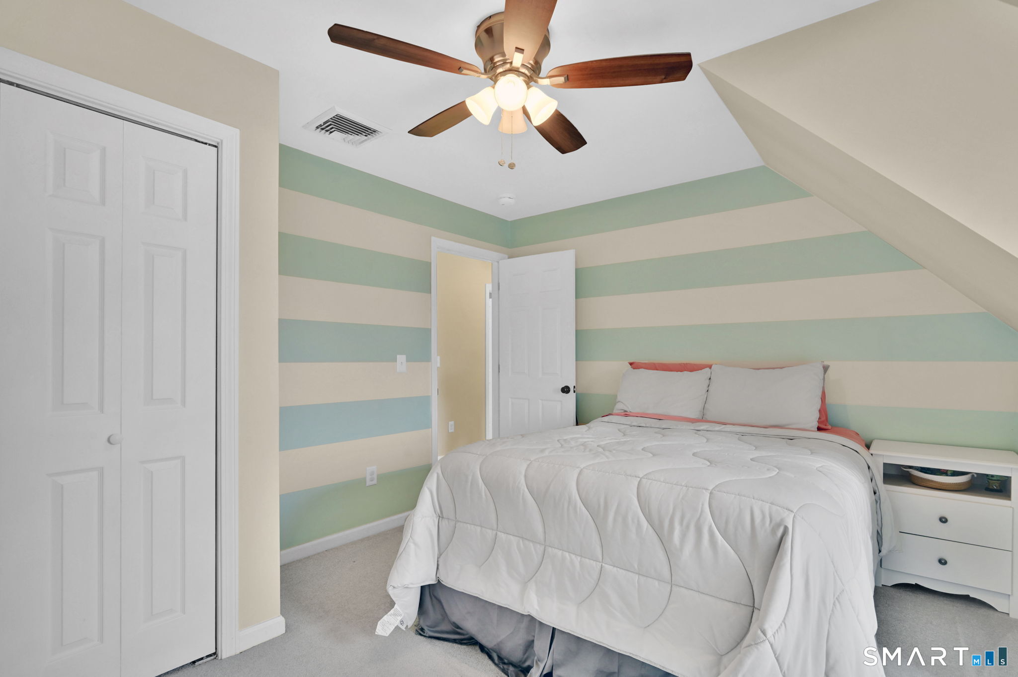 5 Tuckers Run Ledyard, CT 06339 - Photo 29 of 39 a bedroom with a bed and a ceiling fan