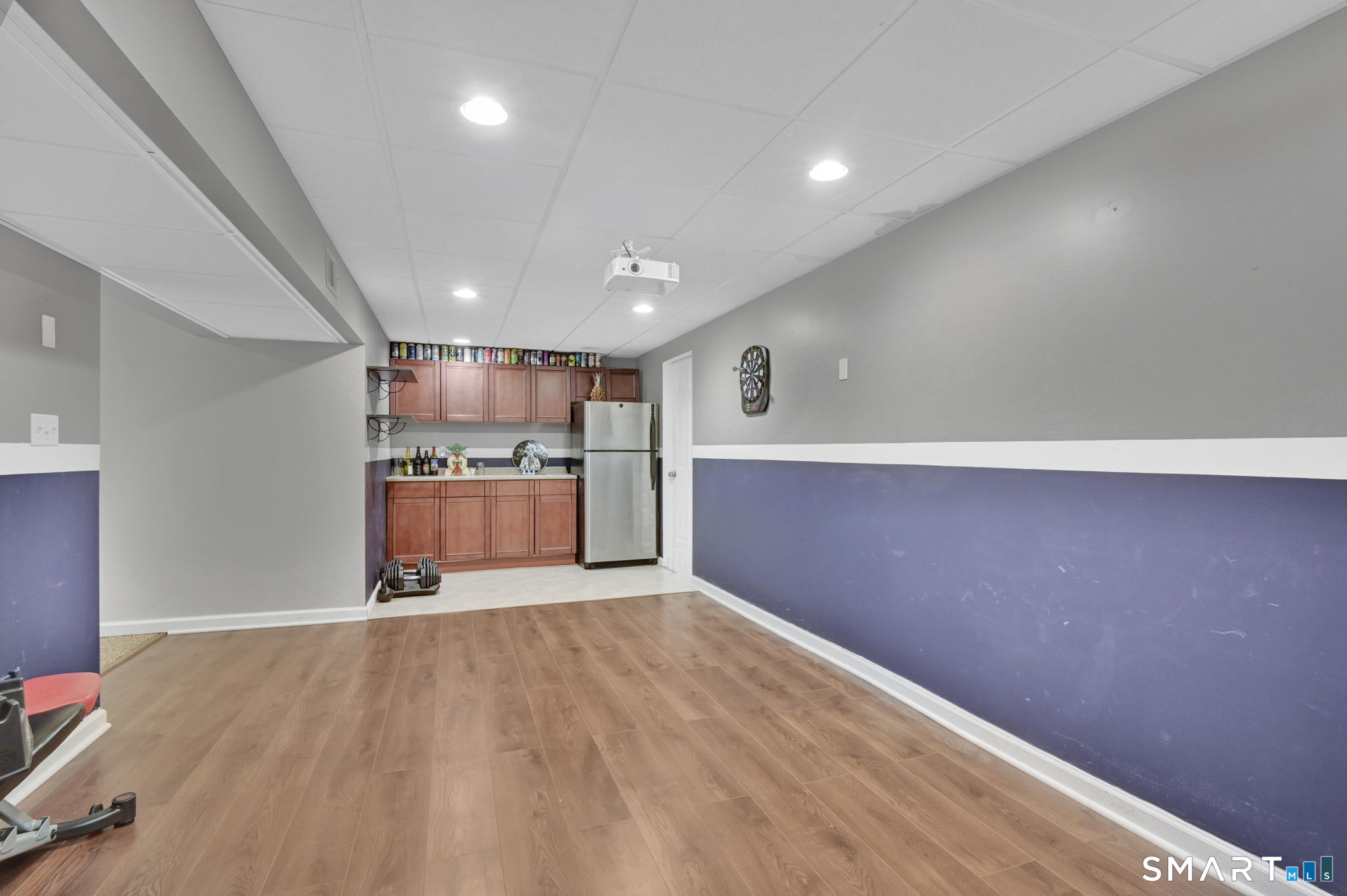 5 Tuckers Run Ledyard, CT 06339 - Photo 31 of 39 an empty room with wooden floor
