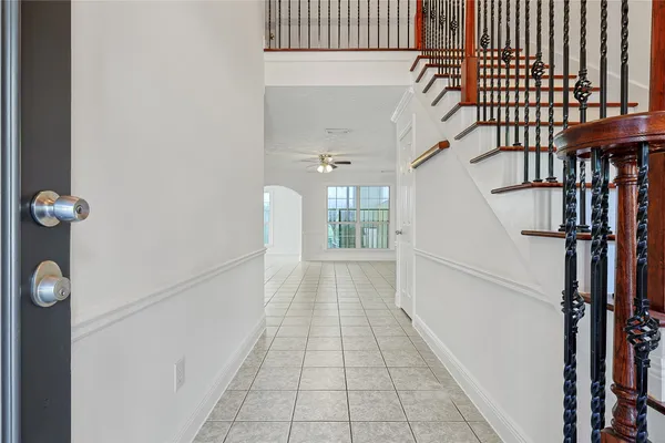 a view of a hallway with windows