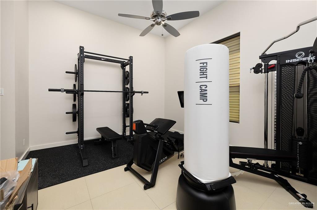 4401 South L Street McAllen, TX 78503 - Photo 15 of 20 a room with gym equipment and a large window