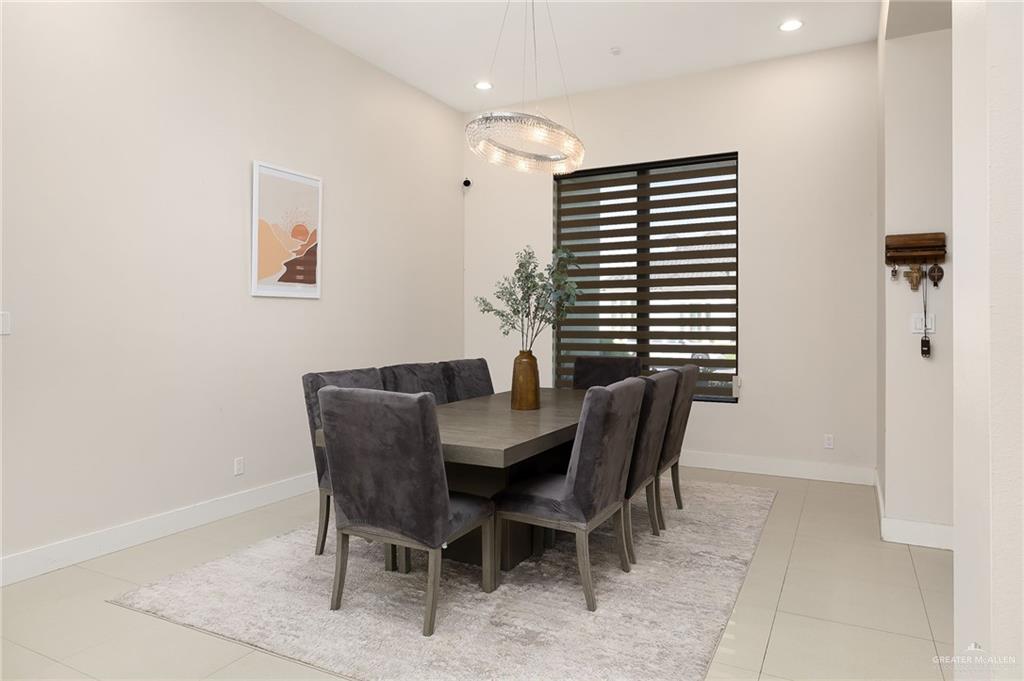 4401 South L Street McAllen, TX 78503 - Photo 4 of 20 a dining room with furniture and window