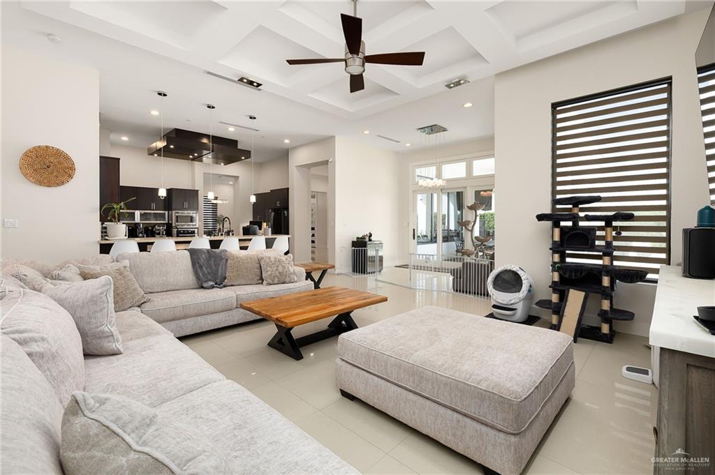 4401 South L Street McAllen, TX 78503 - Photo 5 of 20 a living room with furniture kitchen view and a large window