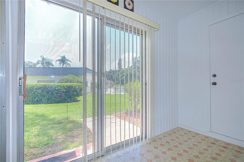 11511 113th Street, Unit 33D Largo, FL 33778 - Photo 16 of 33 a view of a room that has a large window