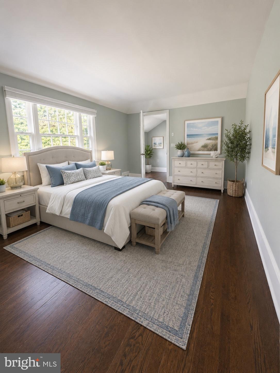 504 Conshohocken State Road Gladwyne, PA 19035 - Photo 8 of 20 a spacious bedroom with a bed couch and a large window