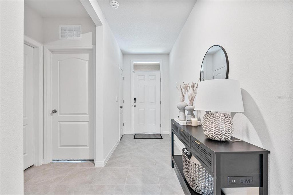 511 Baroness Way DeLand, FL 32724 - Photo 7 of 37 a view of living room with furniture and window